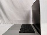 an open laptop computer sitting on top of a white table