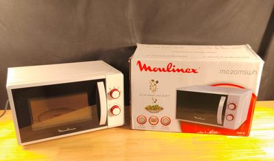Micro ondes Moulinex 800 W La première photo est non contrac…