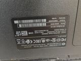 the back side of a laptop with a sticker on it