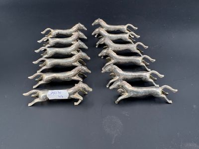 un ensemble de six chevaux au galop anciens en métal argenté