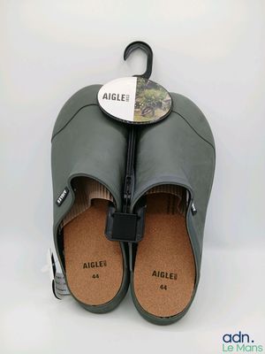 an image of a pair of shoes with an umbrella on top of them