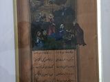 tableau encadré représentant une scène religieuse, exposé dans un musée