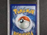 a close up of a card with a pokemon ball on it