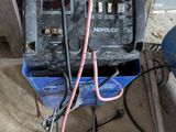 a blue box that has some wires attached to it