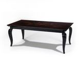une image représentant une table noire ornée d'un motif floral