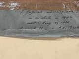 a close up of a piece of cloth with writing on it