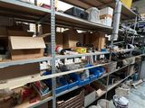many shelves with various tools on them in a garage