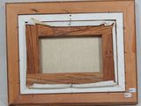 a picture of a picture frame hanging on a wall