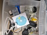 a plastic container with various items in it