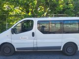 a white van that is parked in the parking lot