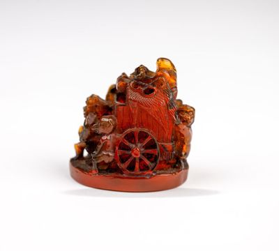 une image représentant une figurine d'un chariot tiré par des animaux