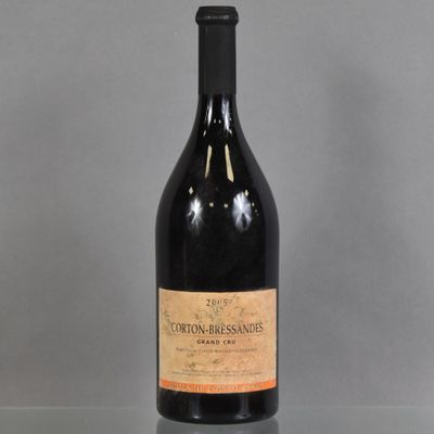 a bottle of wine that is sitting on a table