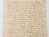a handwritten letter written in black ink on a piece of paper