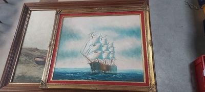 une photo d'un tableau représentant un bateau, dans un cadre