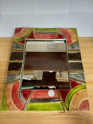 a picture of a picture of a mirror on a table