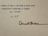 an old book with a black ink writing on it