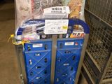 a cart full of boxes and boxes in a warehouse