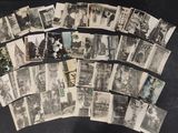 several old black and white photographs of people and buildings on a table