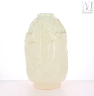 a white vase that has a design on it