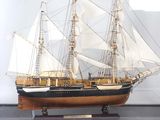 a model of a ship in a glass case