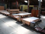many wooden planks in a warehouse with a lot of them