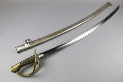 an image of a pair of swords sitting on top of a table