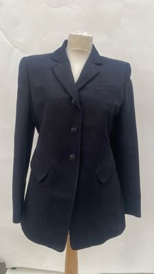 the jacket is black and has buttons on the front