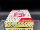 the box is clear and has a yellow and red design on it