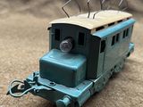 a toy train that is sitting on the ground