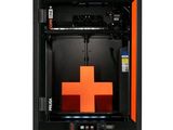 an image of a black and orange 3d printer with a red cross on it
