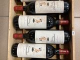 bottles of red wine in a wooden box on a tiled floor