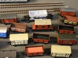 a lot of toy trains that are on the table