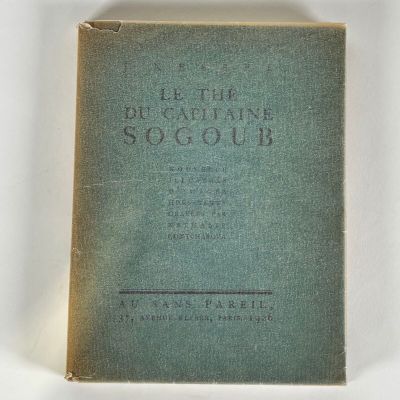a book with a green cover and black writing on it