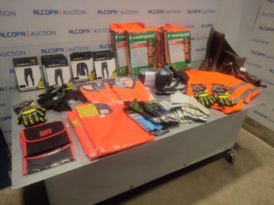 a table with a lot of items on it in front of a wall