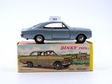 a small toy car sitting on top of a box