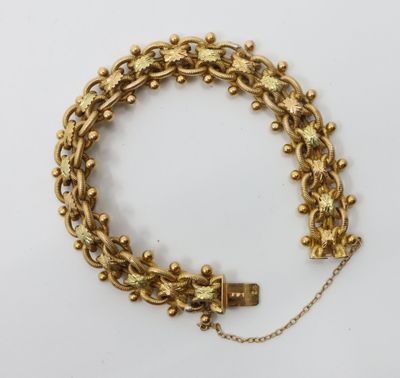 an image of a gold bracelet with a lock on a chain