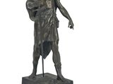 bronze statue of a man holding a basket on a marble base