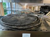 a grill with a lot of plates on top of it