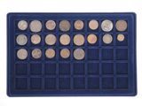 a close up of a blue tray with a lot of coins in it