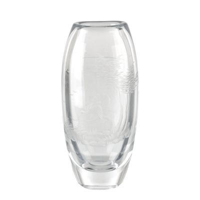 un vase en verre transparent orné d'un motif