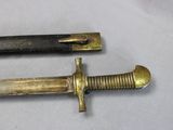 two knives that are sitting on a table