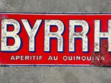 a sign that says byrrh on the side of a building