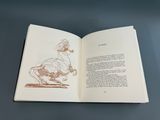 an open book with a drawing of a duck on it