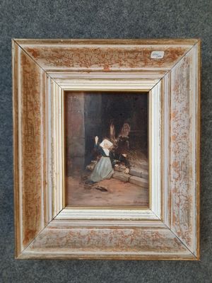 une vieille photo représentant une femme en robe bleue et un homme en chemise blanche