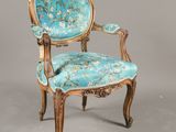 an image of a chair with a blue upholstered upholstered seat