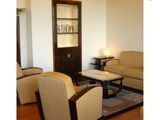 a living room with two couches and a coffee table