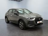 the new dsx suv is parked in a showroom