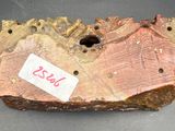 a piece of wood that has a label on it