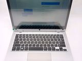 a laptop computer that is sitting on a table