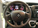 the interior of a car with a steering wheel and dashboard controls